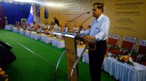 Dr. V. Ravichandran speaks at the Bhoomi Puja ceremony for the Akshaya Patra Foundation Mega Kitchen opening.